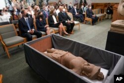 Some of the Cambodian antiquities recovered by the United States Attorney's Office are displayed during a news conference in New York, Monday, Aug. 8, 2022.