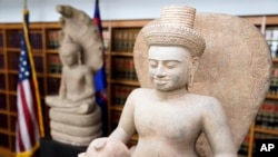 Some of the Cambodian antiquities recovered by the United States Attorney's Office are displayed during a news conference in New York, Monday, Aug. 8, 2022.