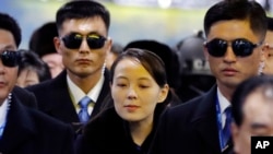 FILE - In this Feb. 9, 2018, photo, North Korean leader Kim Jong Un's younger sister Kim Yo Jong, center, arrives at the Jinbu train station in Pyeongchang, South Korea. 