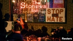 Memorial outside The Stonewall Inn, considered by many the center of New York's gay rights movement, following Pulse Orlando massacre, Manhattan, June 12, 2016.