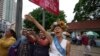 Cambodian Dissident Dresses up as 'Lady Justice' for Trial