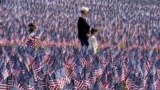 Each year before Memorial Day weekend the Massachusetts Military Heroes Fund places a flag on Boston Common to represent each fallen member of the U.S. military from Massachusetts since the Revolutionary War to the present day. (AP Photo/Steven Senne)