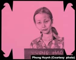 Refugee identification cards of Phung Huynh’s parents depicted on a pink donut box as part of her 'The Pink Donut Box' art project. (Courtesy photo of Phung Huynh)
