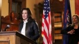 FILE - Michigan Gov. Gretchen Whitmer addresses the state during a speech in Lansing, Mich., Oct. 8, 2020.