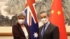 澳洲外交部長黃英賢2022年12月21日在北京會見中國外長王毅。（路透社轉發）