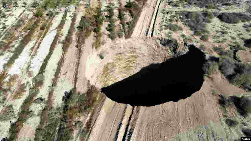 A sinkhole is seen at a mining zone close to Tierra Amarilla town, in Copiapo, Chile, Aug. 1, 2022.