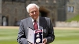 Sir David Attenborough was knighted at a ceremony at Windsor Castle in England, June 8, 2022. (File Photo)