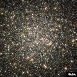 This image, captured by NASA's Hubble Space Telescope, shows the M13, or Hercules constellation, located 25,000 light-years from Earth. Image Credits: NASA, ESA, and the Hubble Heritage Team)