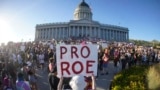 FILE - People attend an abortion-rights protest at the Utah State Capitol in Salt Lake City after the Supreme Court overturned Roe v. Wade, Friday, June 24, 2022. (AP Photo/Rick Bowmer)