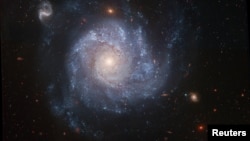A 2005 image of the spiral galaxy NGC 1309, the location of a supernova that did not result in the death of a white dwarf star. (Photo Credit: NASA, ESA, The Hubble Heritage Team, STSCI/AURA, and A. Riess/Handout via REUTERS) 