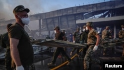 Кременчуг: спасатели на месте трагедии
