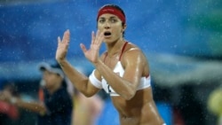 In this Aug. 21, 2008, file photo, Misty May-Treanor, of the United States, reacts during against China in a gold medal women's beach volleyball match at the Chaoyang Park Beach Volleyball Ground at the Beijing 2008 Olympics in Beijing.