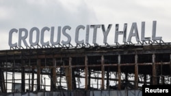 Вид на сгоревший "Крокус Сити Холл". 26 марта 2024 года. REUTERS/Evgenia Novozhenina/File Photo.