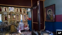 Пострадавшая от обстрелов православная церковь под Киевом. 25 марта 2022г. 