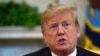 FILE - President Donald Trump speaks in the Oval Office of the White House in Washington, March 27, 2019. 