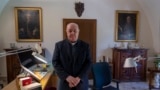 Prefect of the Archivio Apostolico Vaticano, Bishop Sergio Pagano poses in his office at The Vatican, Wednesday, Feb. 14, 2024, after an interview with The Associated Press. (AP Photo/Domenico Stinellis)