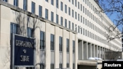 FILE - The State Department Building is pictured in Washington, Jan. 26, 2017. The US has barred four former Malawi officials from entry due to their involvement in corruption, the State Department says. 