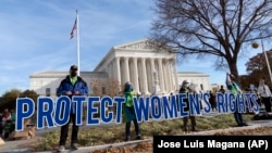 Abortion rights advocates in front of the Supreme Court on Dec. 1, 2021. (AP Photo/Jose Luis Magana)