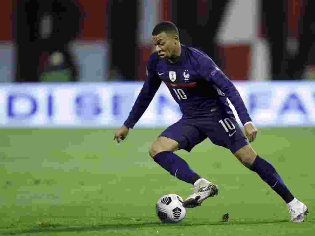 Kylian Mbappé, PSG - Forward - Striker The French Football Federation (FFF) confirmed in early September Paris Saint-Germain and France striker Kylian Mbappé tested positive for COVID-19. Mbappé marked his recovery and return to action with a goal in a 3-0 PSG win over Nice. Photo: France&#39;s Kylian Mbappe controls the ball during the UEFA Nations League soccer match between Croatia and France at Maksimir Stadium in Zagreb, Croatia, Wednesday, Oct. 14, 2020. (AP Photo/Darko Bandic)
