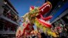 A dragon puppet is marched down Mott Street during the Lunar New Year parade in Manhattan's Chinatown, Feb. 25, 2024, in New York.