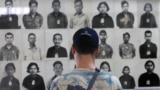 A tourist visits the Tuol Sleng Genocide Museum, also known as the notorious security prison S-21, in Phnom Penh March 3, 2015. A U.N.-backed war crimes tribunal in Cambodia on Tuesday charged two former cadres of the Khmer Rouge regime with crimes agains