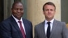 France's President Emmanuel Macron (R) poses with President of Central African Republic Faustin-Archange Touadera (L) prior to a working lunch at the presidential Elysee Palace in Paris on April 17, 2024. (Photo by Bertrand GUAY / AFP)