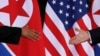 FILE - U.S. President Donald Trump and North Korea's leader Kim Jong Un meet at the start of their summit on the resort island of Sentosa, Singapore, June 12, 2018. The U.S. should not grant unilateral concessions and sanctions relief to North Korea as a 