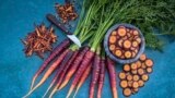 This image provided by Baker Creek Heirloom Seed Co. shows Lila Lu Sang carrots, which are deep purple on the outside and bright orange on the inside. (Baker Creek Heirloom Seed Co./rareseeds.com via AP)