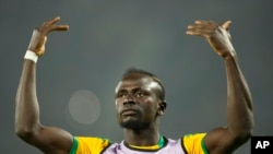 FILE - Senegal's Sadio Mane gestures prior to the start of the African Cup of Nations 2022 final against Egypt at the Ahmadou Ahidjo stadium in Yaounde, Cameroon, on February 6, 2022.