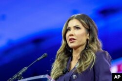 FILE - South Dakota Governor Kristi Noem speaks during the Conservative Political Action Conference in Oxon Hill, Maryland, on Feb. 23, 2024.