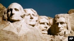 FILE - In this undated file photo, Mount Rushmore is shown in South Dakota. From left are George Washington, Thomas Jefferson, Teddy Roosevelt and Abraham Lincoln. 
