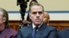 FILE - Hunter Biden, shown here at a U.S. House of Representatives Oversight Committee meeting on Capitol Hill in Washington on Jan. 20, 2024, turned down an invitation to appear for a House public hearing, his lawyer said on March 13.