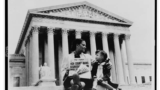 A mother explains the Supreme Court's decision to her three-year-old daughter, November 19, 1954.