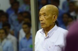 FILE - Kaing Guek Eav alias Duch on 8 June 2016 during his testimony in Case 002/02 against Khieu Samphan and Nuon Chea. Duch passed away in 2020. (ECCC/Nhet Sok Heng)