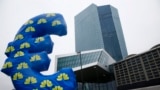 Inflated euro sign is seen outside the new head quarters of the European Central Bank (ECB) in Frankfurt, Jan. 22, 2015. 
