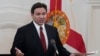 El gobernador de Florida, Ron DeSantis, habla en una conferencia de prensa el lunes 5 de febrero de 2024 en Miami Beach, Florida. DeSantis habló sobre la legislación que se está considerando para prohibir los campamentos para personas sin hogar en propiedad pública.