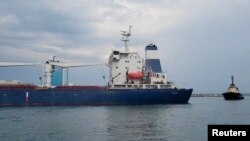 The Sierra Leone-flagged cargo ship, Razoni carrying Ukrainian grain leaves the port, in Odesa, Ukraine, August 1, 2022. (Oleksandr Kubrakov/ Ukraine Ministry of Infrastructure/Handout via REUTERS)