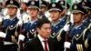 FILE - Sukhbaatar Batbold, then prime minister of Mongolia, inspects an honor guard during an official welcoming ceremony in the Great Hall of the People in Beijing, June 16, 2011.