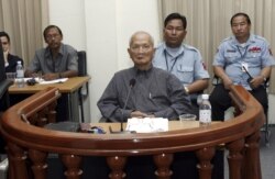FILE - Nuon Chea, Pol Pot's right hand man of the Khmer Rouge regime, sits in the dock during his first public appearance at the Extraordinary Chambers in the Courts of Cambodia (ECCC) on the outskirts of Phnom Penh February 4, 2008. Noun Chea passed away in 2019. (REUTERS/Chor Sokunthea)