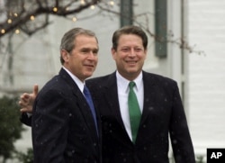 FILE - The 2000 election, between George Bush (left) and Al Gore, was the closest race since 1876. (AP Photo/J. Scott Applewhite)