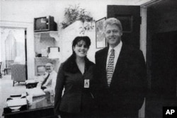 FILE - Official White House photo from Independent Counsel Kenneth Starr's report on Clinton, showing the president and Monica Lewinsky at the White House in 1995.