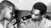 Lt. Col. Philip Effiong, right, acting head of state who announced the formal surrender of Biafra, talks in Owerri, Biafra's last stronghold, to Col. Olusegun Obasanjo, who accepted the field surrender of Biafra's armed forces, Jan. 15, 1970.