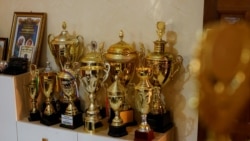 Trophies awarded to Fallou Diop, a jockey, are displayed at his coach Adama Bao's home, who owns the Lambafar stable, in Dakar, Senegal, February 4, 2021. (REUTERS/Zohra Bensemra)