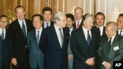 FILE PHOTO - Foreign ministers attending the Paris Peace Conference on Cambodia pose prior to the meeting, Oct. 23, 1991.