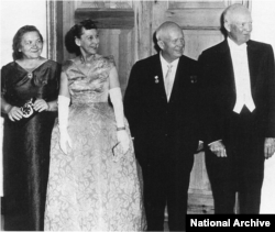 The Eisenhowers and Khrushchevs at a state dinner in 1959. The Soviet's successful launch of the first man-made satellite, Sputnik, intensified the competition between the countries.