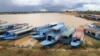 Boats for taking tourists to nearby Tonle Sap lake anchor inside Sou Jing Company development site in Siem Reap province, August 11, 2021. (Photo provided by So Rosa)