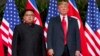 FILE - U.S. President Donald Trump, right, meets with North Korean leader Kim Jong Un on Sentosa Island, in Singapore, June. 12, 2018. 