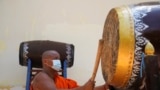 Cambodia pagodas use traditional drums and gongs to send alert on COVID-19