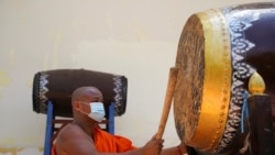 Cambodia pagodas use traditional drums and gongs to send alert on COVID-19