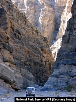 The narrows of Titus Canyon can be explored either by vehicle or on foot